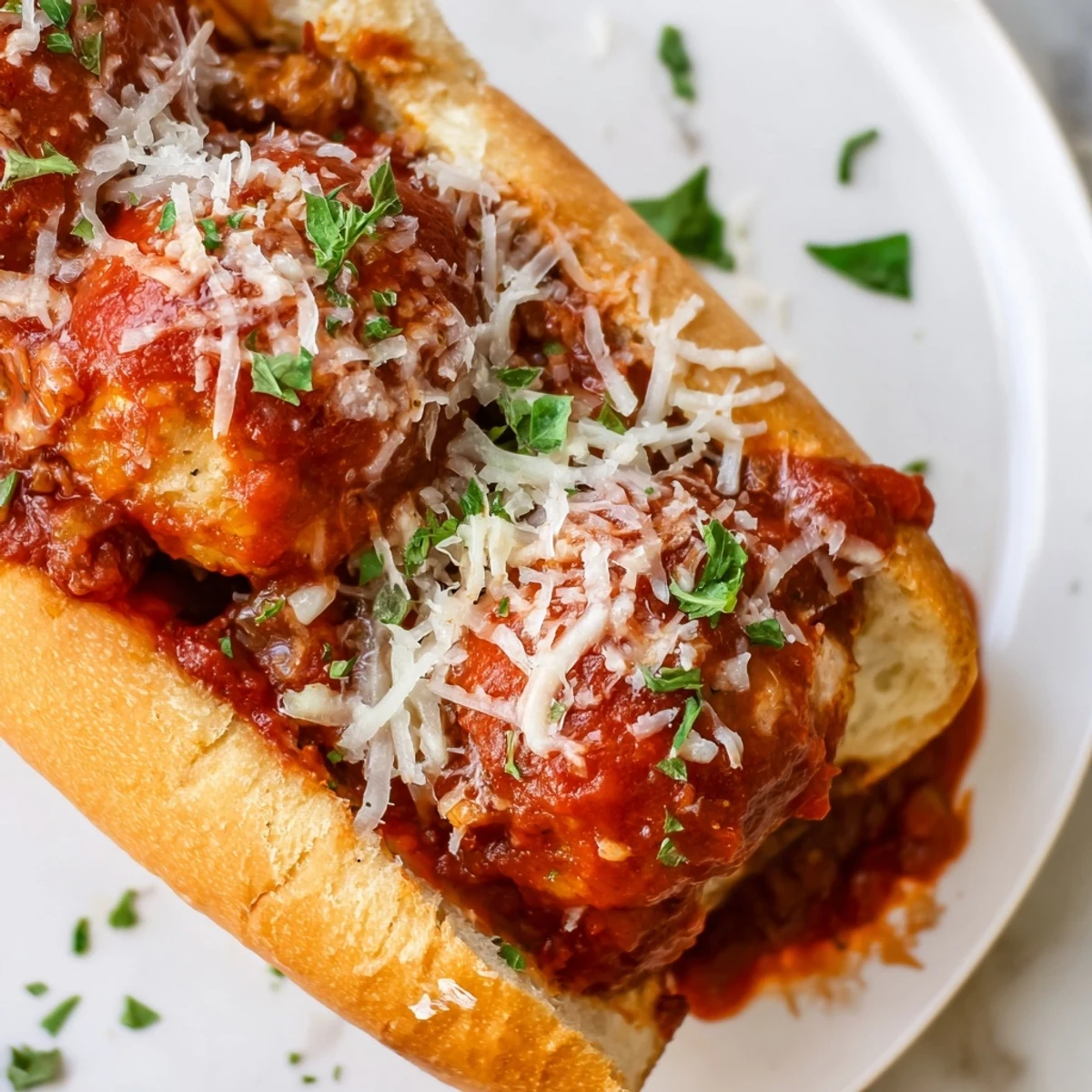 Steaming hot Turkey Meatball Sub oozing with melted mozzarella cheese, a comforting homestyle meal.