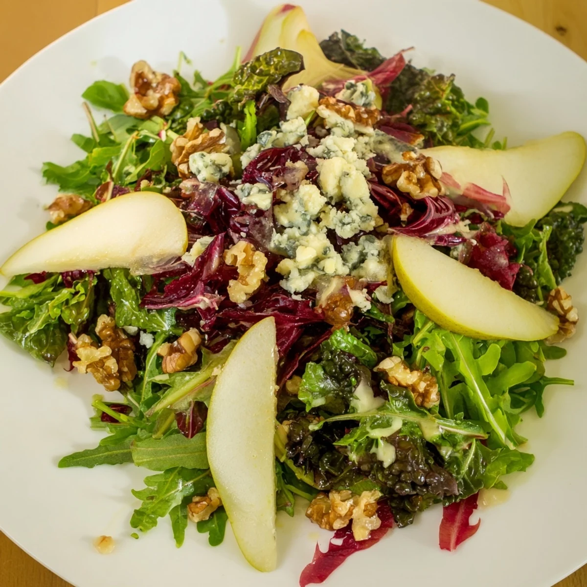 Enjoy this refreshing Winter Green Salad with Pear and Walnuts alongside roasted chicken or as a light vegetarian appetizer.