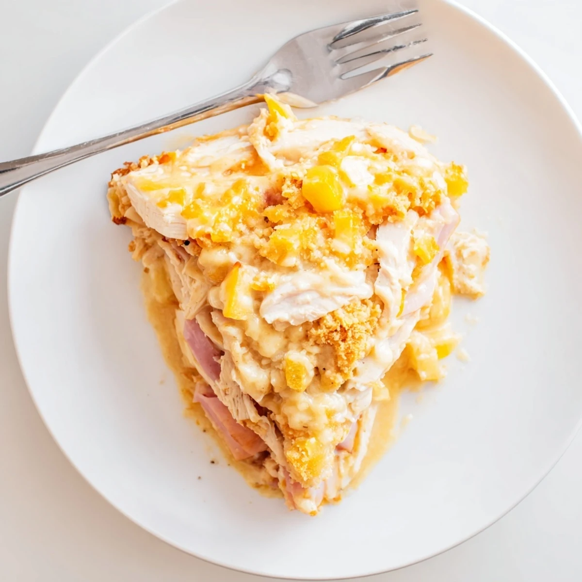 Fresh from oven Chicken Cordon Bleu Casserole Recipe, golden crust, pairs with salad