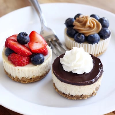 Golden graham cracker crust cups filled with smooth, rich mini cheesecake batter